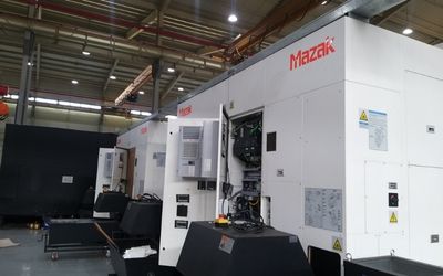 Installation of AC Panel on Mazak CNC Machine in Production Area